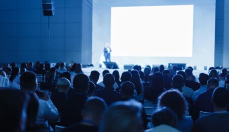 Presentation screen in full auditorium